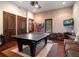Spacious game room featuring a ping pong table, exposed brick, and ample seating at 10930 Spring St, Largo, FL 33774