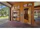 Barn with horse saddles, awards room, and tack room with garage door to the pastures at 10930 Spring St, Largo, FL 33774
