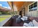 Comfortable outdoor living space with brick flooring and wood ceiling at 10930 Spring St, Largo, FL 33774