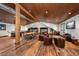 Expansive recreation room with bunk beds, a dining table, and multiple seating areas for relaxation at 10930 Spring St, Largo, FL 33774