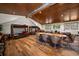 Large recreation room featuring a dining table, bunk beds, and a comfortable seating area at 10930 Spring St, Largo, FL 33774