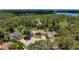 Aerial view of a single Gathering home nestled in a lush green environment with a private pool at 11362 Heritage Way, Largo, FL 33778