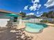 Backyard with a pool, spa, patio and outdoor seating at 11362 Heritage Way, Largo, FL 33778