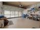 Spacious garage with screen door, storage and lighting at 11439 Golf Round Dr, New Port Richey, FL 34654