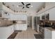 Spacious kitchen featuring stainless steel appliances, tile flooring, and ample cabinet space at 11439 Golf Round Dr, New Port Richey, FL 34654