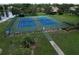 Well-maintained tennis and pickleball courts offer residents an active lifestyle surrounded by green spaces at 11439 Golf Round Dr, New Port Richey, FL 34654