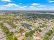 This neighborhood features lots of trees and a tranquil pond perfect for calm living at 11830 Autumn Creek Dr, Riverview, FL 33569