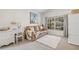 Cozy living area with comfortable seating, a bright window, and stylish decor at 11830 Autumn Creek Dr, Riverview, FL 33569