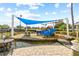 A colorful playground provides a fun and safe environment for children to play and explore at 11830 Autumn Creek Dr, Riverview, FL 33569