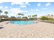 A resort-style pool offers residents an ideal space for relaxation and recreation, alongside ample seating at 11830 Autumn Creek Dr, Riverview, FL 33569