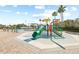 Community pool featuring a vibrant splash pad with slide and water features for Gathering fun at 11830 Autumn Creek Dr, Riverview, FL 33569