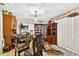 Dining room with dark wood furniture and a chandelier at 1213 Cuttingin Pl, Tampa, FL 33612