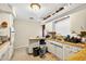 Functional kitchen featuring light cabinetry and plenty of counter space at 1213 Cuttingin Pl, Tampa, FL 33612