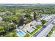 Aerial view of a community with a pool, shuffleboard and tennis courts at 12400 Park Blvd # 519, Seminole, FL 33772