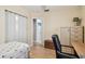 Bright bedroom with wooden floors, closet, and a view to bathroom at 12400 Park Blvd # 519, Seminole, FL 33772
