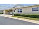 Charming one-story villa featuring a covered carport, well-maintained landscaping, and a welcoming entrance at 12400 Park Blvd # 519, Seminole, FL 33772