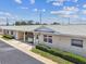 Charming one-story villa featuring a covered carport, well-maintained landscaping, and a welcoming entrance at 12400 Park Blvd # 519, Seminole, FL 33772