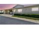 Charming one-story villa featuring a covered carport, well-maintained landscaping, and a welcoming entrance at 12400 Park Blvd # 519, Seminole, FL 33772