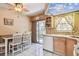 Kitchen area featuring a casual dining table, tile flooring, and sliding doors to the outside at 12400 Park Blvd # 519, Seminole, FL 33772