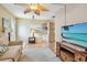Comfortable living room with light colored sofa, ceiling fan, and stylish decor at 12400 Park Blvd # 519, Seminole, FL 33772