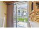 Outdoor patio with a seating area, accessible through sliding glass doors from the kitchen at 12400 Park Blvd # 519, Seminole, FL 33772