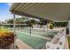 Relaxing shuffleboard courts with benches and shade for friendly competition at 12400 Park Blvd # 519, Seminole, FL 33772