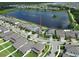 An aerial view showing a home with a pond view in a quiet neighborhood at 12821 Satin Lily Dr, Riverview, FL 33579