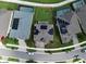 An aerial shot displaying the property lines with a focus on its lush lawn at 12821 Satin Lily Dr, Riverview, FL 33579