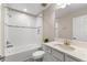 Clean bathroom with a tub, shower, and modern fixtures at 12821 Satin Lily Dr, Riverview, FL 33579