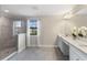 Beautiful bathroom with a glass enclosed shower and double vanity sinks at 12821 Satin Lily Dr, Riverview, FL 33579