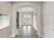 Elegant entryway featuring tile flooring and a view of the front door at 12821 Satin Lily Dr, Riverview, FL 33579