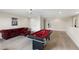 Upper level game room has a pool table, comfortable seating and lots of room to entertain at 12821 Satin Lily Dr, Riverview, FL 33579