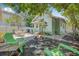 Inviting backyard with a fire pit, outdoor seating, and lush landscaping, creating an ideal space for gatherings and relaxation at 1415 7Th N Ave, St Petersburg, FL 33705