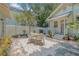Inviting backyard featuring a dining set and stone patio, perfect for outdoor entertaining at 1415 7Th N Ave, St Petersburg, FL 33705