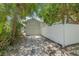 Long driveway leading to a detached garage and a fenced yard at 1415 7Th N Ave, St Petersburg, FL 33705