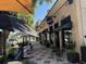 Brick building featuring upscale restaurants with outdoor seating and decorative sidewalks at 1415 7Th N Ave, St Petersburg, FL 33705