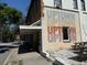 Exterior of business with colorful mural and outdoor seating at 1415 7Th N Ave, St Petersburg, FL 33705