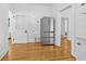 Spacious kitchen with stainless steel refrigerator and hardwood floors at 1415 7Th N Ave, St Petersburg, FL 33705