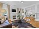 Bright living room with fireplace, hardwood floors, and elegant furnishings at 1415 7Th N Ave, St Petersburg, FL 33705