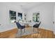 Bright home office with hardwood floors, two light filled windows, and neutral decor, perfect for a productive workspace at 1415 7Th N Ave, St Petersburg, FL 33705