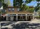 Charming storefront with outdoor seating and a welcoming ambiance, perfect for a coffee shop at 1415 7Th N Ave, St Petersburg, FL 33705