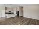 Open-concept living space featuring a modern kitchen and expansive flooring at 14817 Summer Branch Dr, Lithia, FL 33547