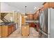 Well-equipped kitchen features stainless steel appliances, granite counters, and a center island at 16102 Colchester Palms Dr, Tampa, FL 33647