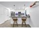 Stylish kitchen with stainless steel appliances, granite countertops, and bar seating at 1717 Preston S St, St Petersburg, FL 33712