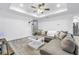 Comfortable living room with modern furniture, tray ceilings and plenty of natural light at 1717 Preston S St, St Petersburg, FL 33712