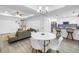 Open concept living space featuring modern décor, an eat-in kitchen, living room and dining area at 1717 Preston S St, St Petersburg, FL 33712
