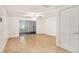 Versatile bonus room featuring ample space and sliding glass doors leading outside at 1741 Font Ln, Holiday, FL 34691