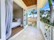 Balcony access to the main bedroom offers outdoor living space and natural light at 17715 Wall Cir, Redington Shores, FL 33708