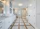 Spacious bathroom with dual vanities, large shower, and tub at 17715 Wall Cir, Redington Shores, FL 33708