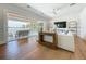 The living room flows to the outside balcony with water views at 17715 Wall Cir, Redington Shores, FL 33708